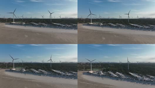 航拍福建平潭岛海滩风力发电机高清在线视频素材下载