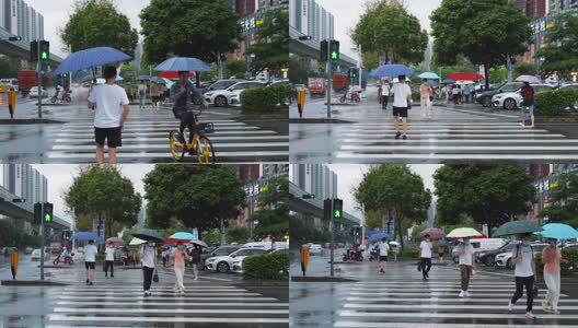 雨中出行通勤的行人车辆高清在线视频素材下载