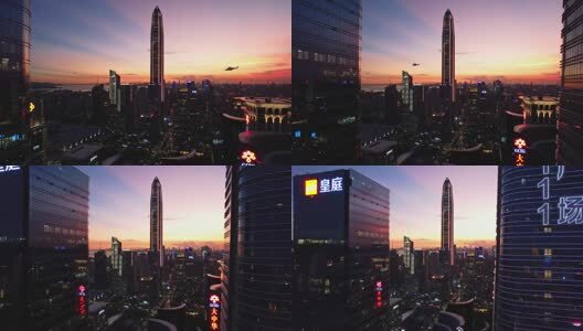 深圳福田CBD平安金融中心大中华在世纪晚霞中飞行的直升机高清在线视频素材下载