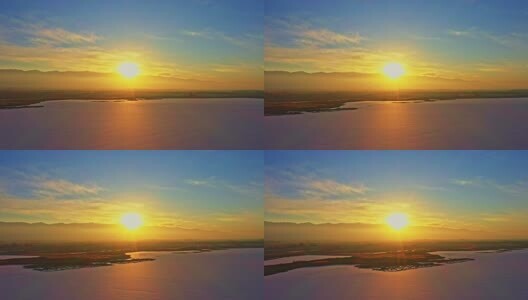 航拍阳光下结冰的湖面高清在线视频素材下载