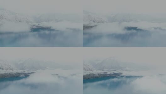 航拍雪后的西藏林芝巴松措云雾缭绕高清在线视频素材下载