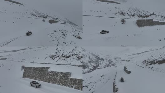 丙察察雪地行驶的越野车高清在线视频素材下载