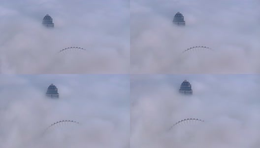 云海中的南昌之星摩天轮高清在线视频素材下载