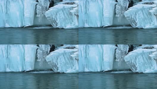 冬季湖面瀑布结冰与泉水高清在线视频素材下载