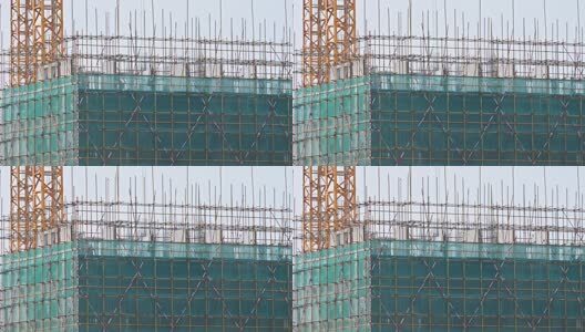 建筑工地施工塔吊工程吊车架子起重机旋转高清在线视频素材下载