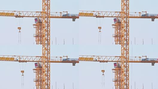 建筑工地施工塔吊工程吊车架子起重机旋转高清在线视频素材下载
