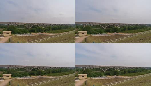 山东省烟台市招远市水库堤坝蓝天白云城市建筑风光延时视频高清在线视频素材下载