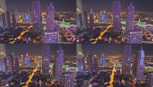 天津和平区解放北路世纪钟解放桥夜景航拍高清在线视频素材下载