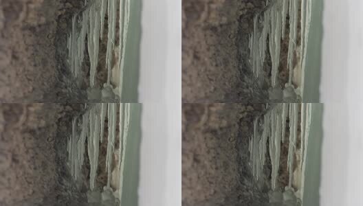 初春正在消融的冰柱高清在线视频素材下载