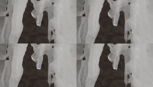 初春正在消融的冰柱高清在线视频素材下载