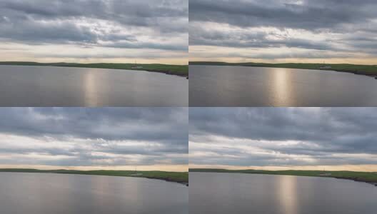 呼伦贝尔草原呼伦湖云隙光日落延时高清在线视频素材下载