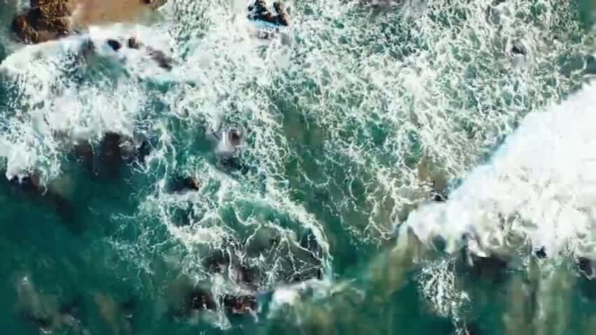 4K俯拍海南万宁沙滩海岸唯美海浪