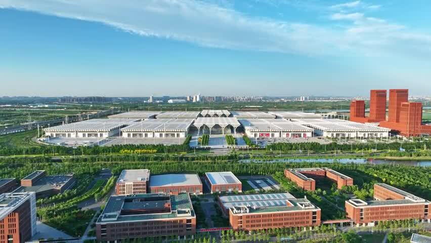 航拍蓝天白云下的天津国家会展中心