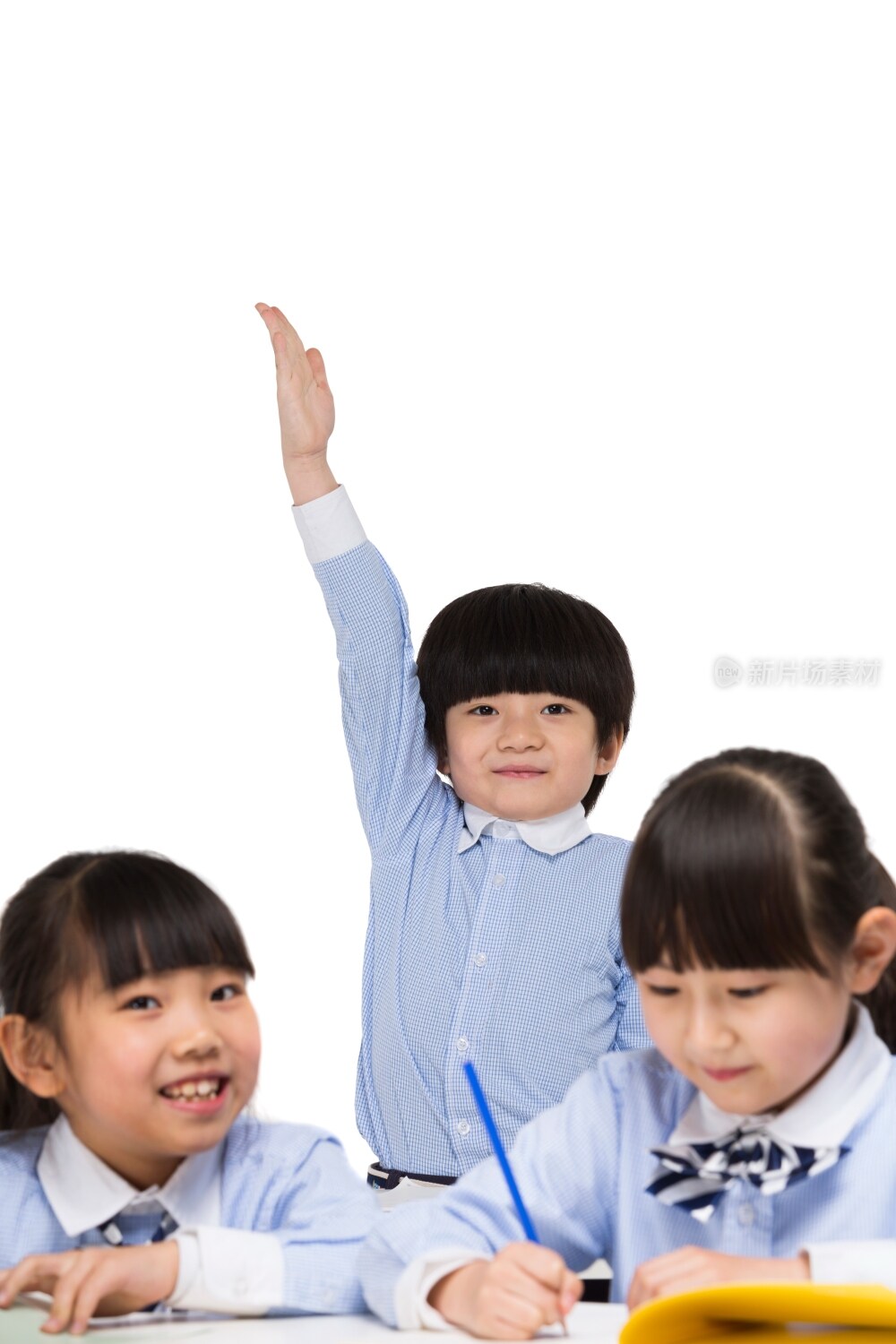 小学生上课举起手