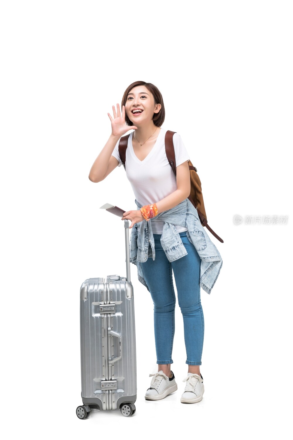 年轻女子拿着护照去旅行