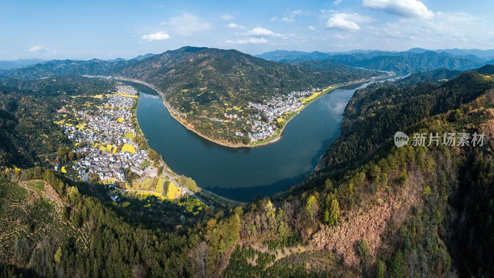 航拍新安江山水画廊江边村庄油菜花
