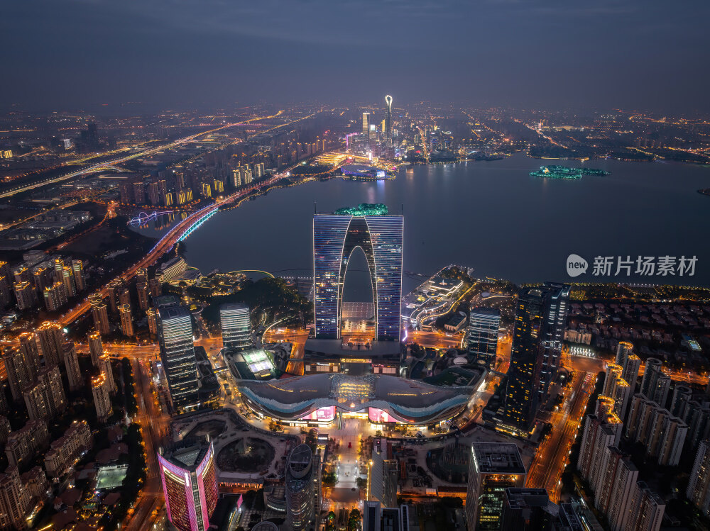 江苏苏州金鸡湖东方之门CBD日落夜景航拍