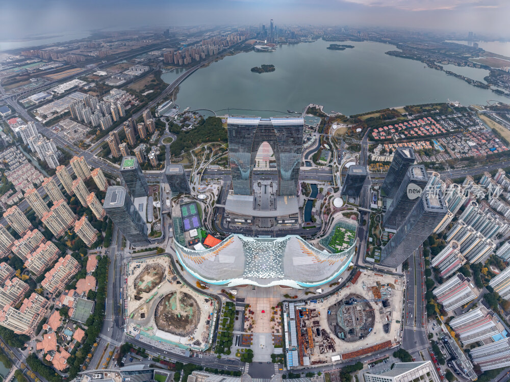 江苏苏州金鸡湖东方之门CBD日落夜景航拍