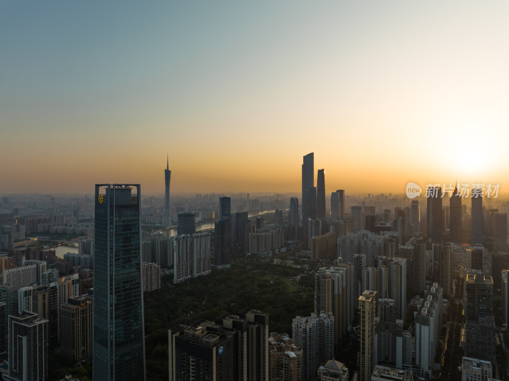 航拍日落下的广州天河城市风光